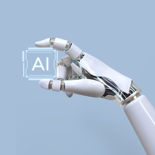 Photo showing a Mechanical arm holding an AI chip. Demonstrating the role of AI