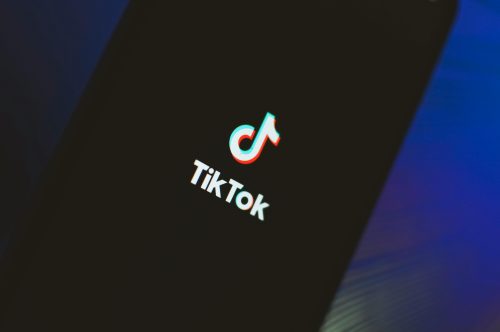 Phone showing TikTok on the screen